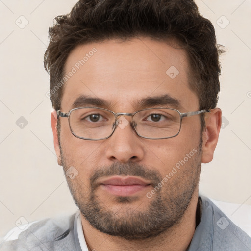 Neutral white young-adult male with short  brown hair and brown eyes