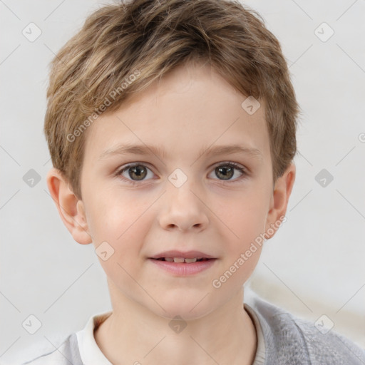 Joyful white child male with short  brown hair and brown eyes