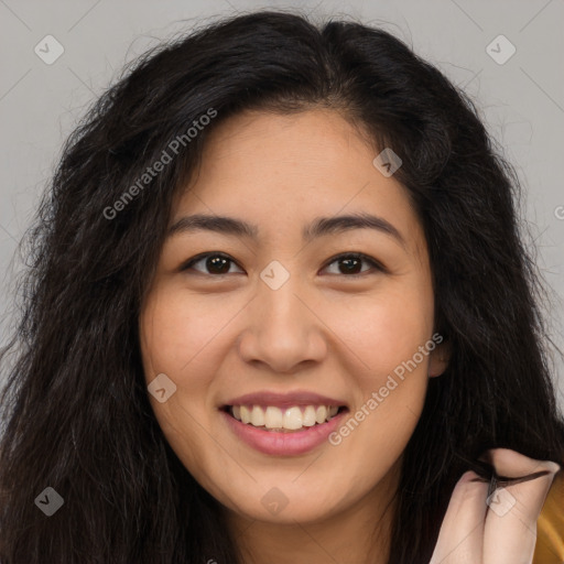 Joyful latino young-adult female with long  brown hair and brown eyes