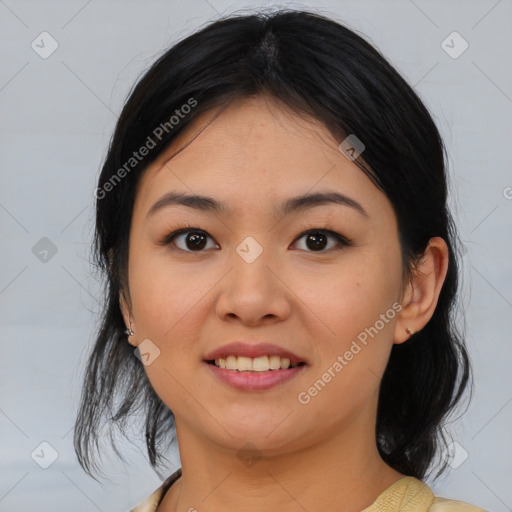 Joyful asian young-adult female with medium  brown hair and brown eyes