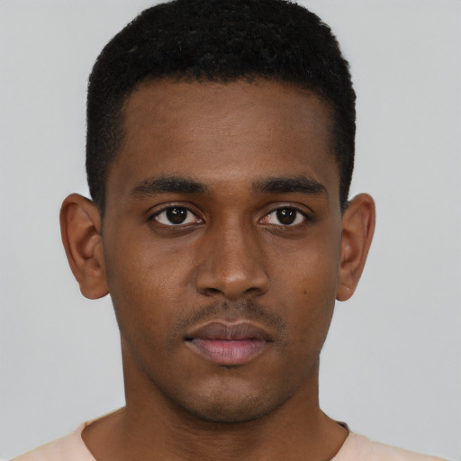 Neutral black young-adult male with short  black hair and brown eyes
