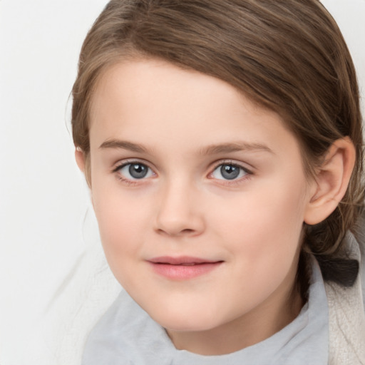 Joyful white child female with medium  brown hair and grey eyes