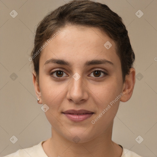 Joyful white young-adult female with short  brown hair and brown eyes