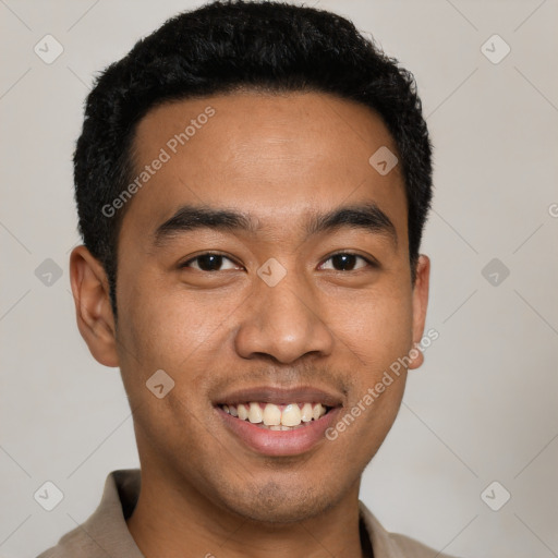 Joyful latino young-adult male with short  black hair and brown eyes