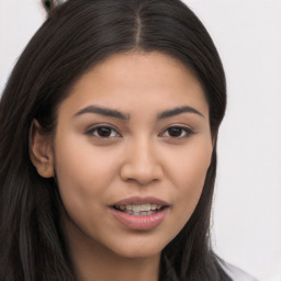 Joyful asian young-adult female with long  brown hair and brown eyes