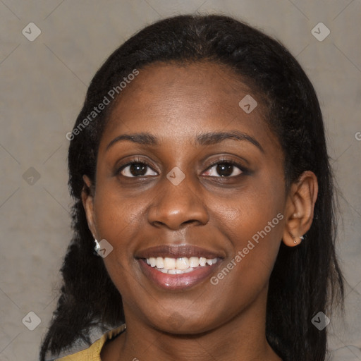 Joyful black young-adult female with medium  black hair and brown eyes