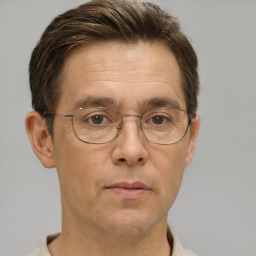 Neutral white adult male with short  brown hair and brown eyes