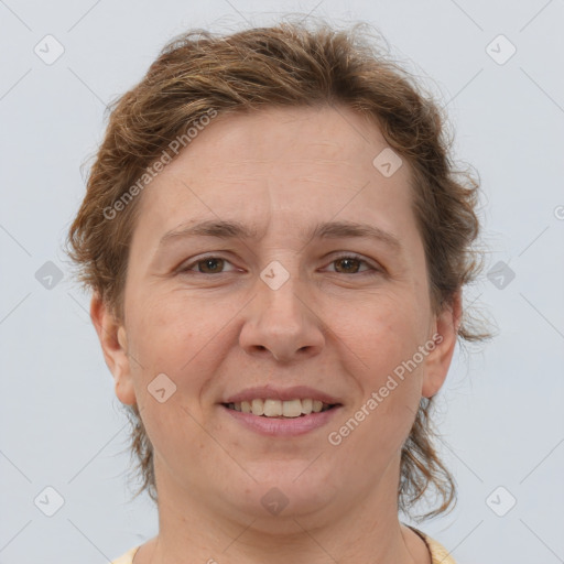 Joyful white adult female with medium  brown hair and grey eyes