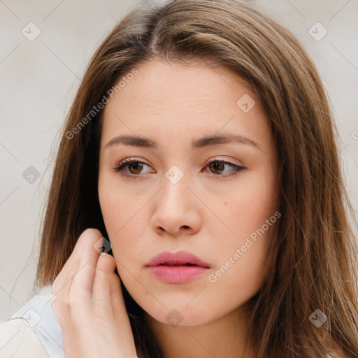 Neutral white young-adult female with long  brown hair and brown eyes