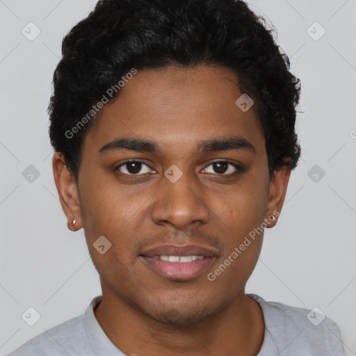 Joyful black young-adult male with short  brown hair and brown eyes
