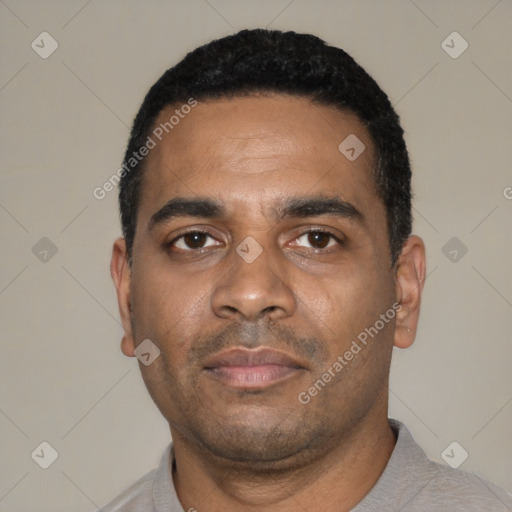 Neutral latino young-adult male with short  black hair and brown eyes