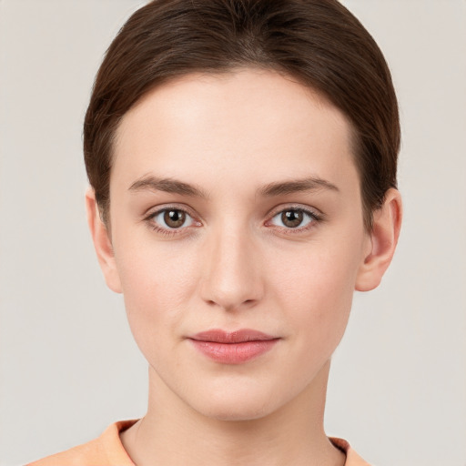 Neutral white young-adult female with short  brown hair and brown eyes