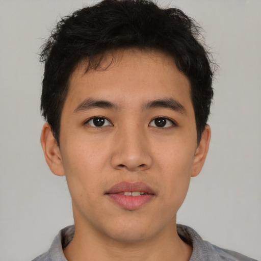 Neutral asian young-adult male with short  brown hair and brown eyes