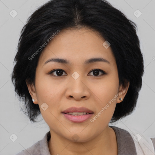 Joyful asian young-adult female with medium  black hair and brown eyes