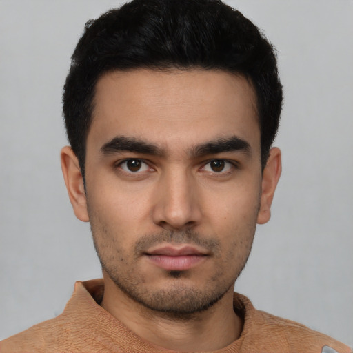 Neutral latino young-adult male with short  black hair and brown eyes