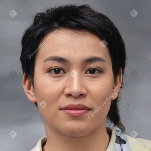 Joyful asian young-adult female with medium  black hair and brown eyes