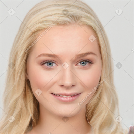 Joyful white young-adult female with long  brown hair and blue eyes