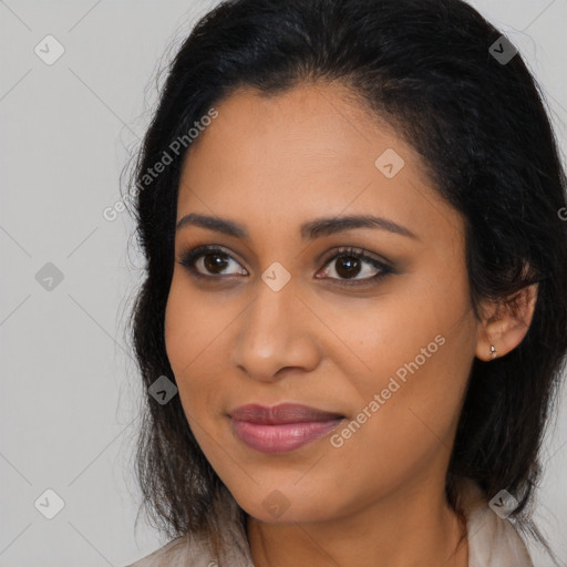 Joyful latino young-adult female with long  brown hair and brown eyes