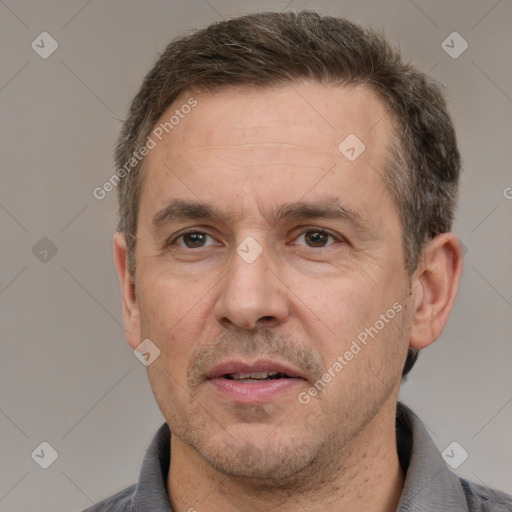 Neutral white adult male with short  brown hair and brown eyes