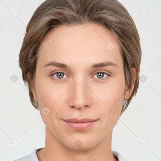 Joyful white young-adult female with short  brown hair and grey eyes