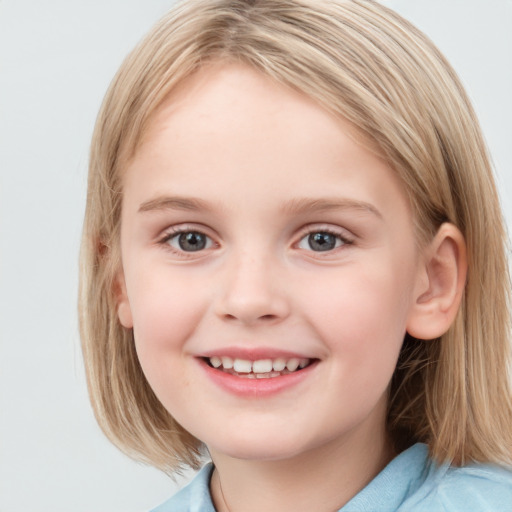 Joyful white child female with medium  brown hair and grey eyes