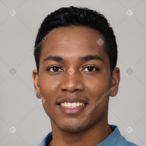 Joyful black young-adult male with short  black hair and brown eyes