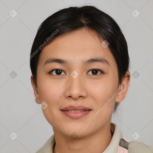 Joyful asian young-adult female with short  brown hair and brown eyes