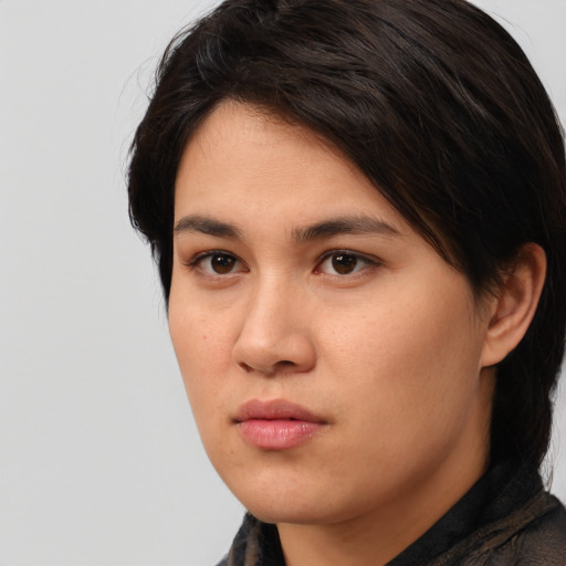 Neutral white young-adult female with medium  brown hair and brown eyes