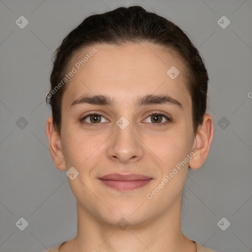 Joyful white young-adult female with short  brown hair and brown eyes