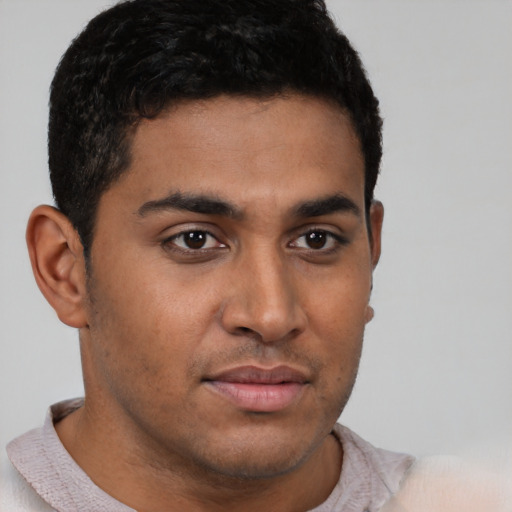 Neutral latino young-adult male with short  brown hair and brown eyes