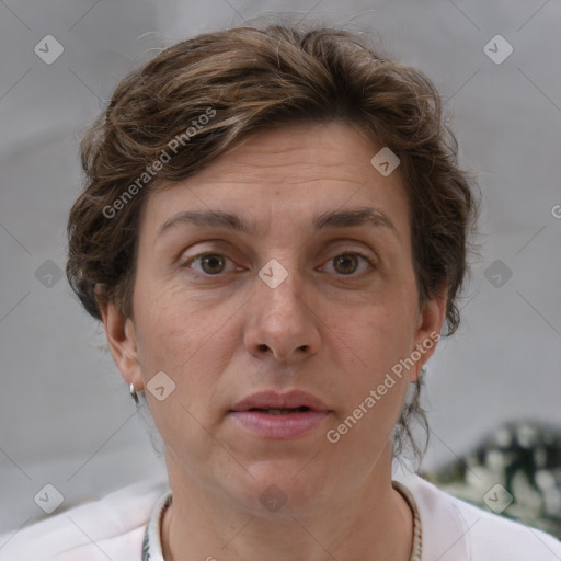 Joyful white adult female with short  brown hair and brown eyes