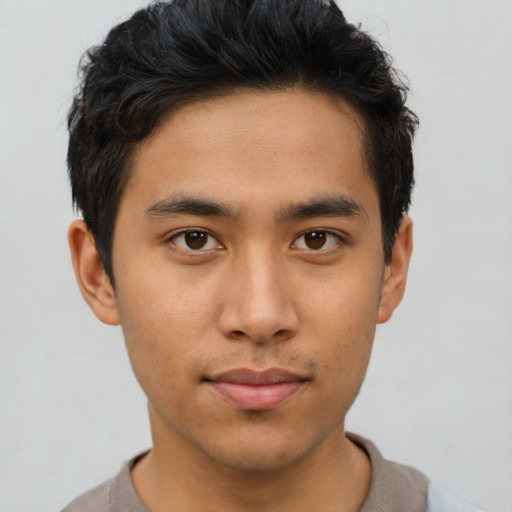 Neutral asian young-adult male with short  brown hair and brown eyes