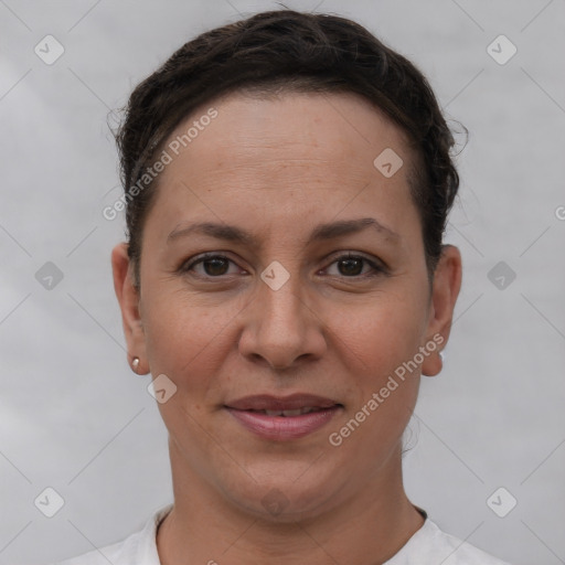 Joyful white adult female with short  brown hair and brown eyes