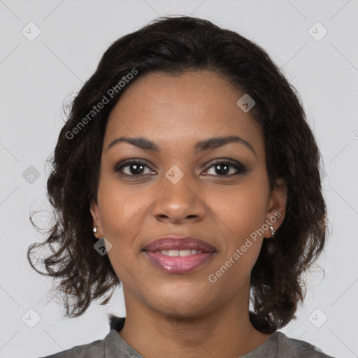 Joyful black young-adult female with medium  brown hair and brown eyes