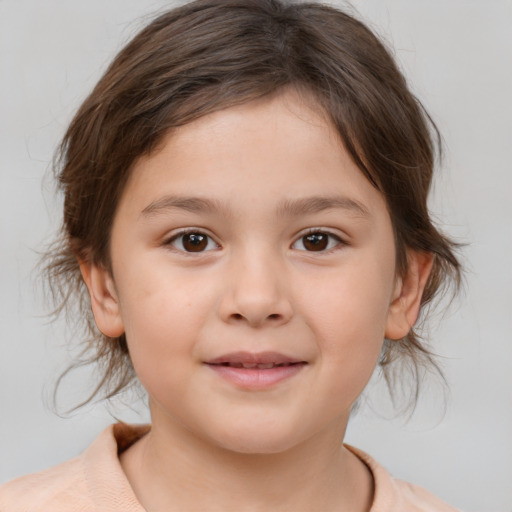 Joyful white child female with medium  brown hair and brown eyes