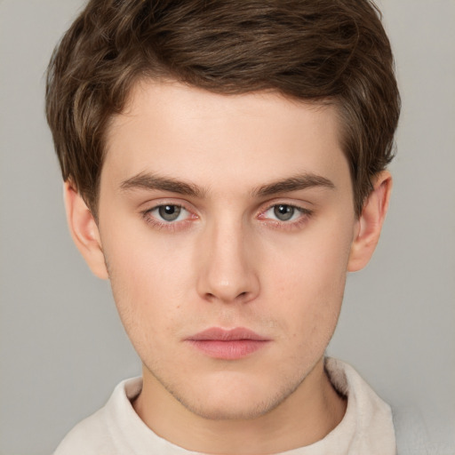 Neutral white young-adult male with short  brown hair and grey eyes