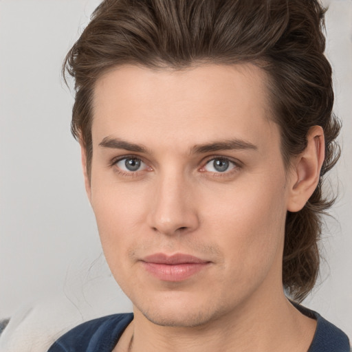 Neutral white young-adult male with medium  brown hair and brown eyes