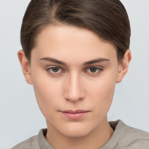 Neutral white young-adult female with short  brown hair and brown eyes