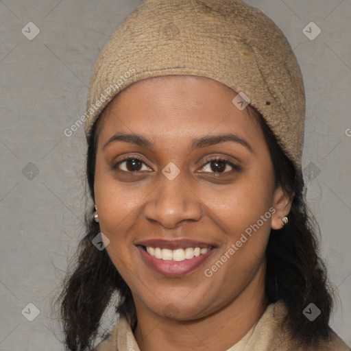 Joyful black young-adult female with medium  brown hair and brown eyes