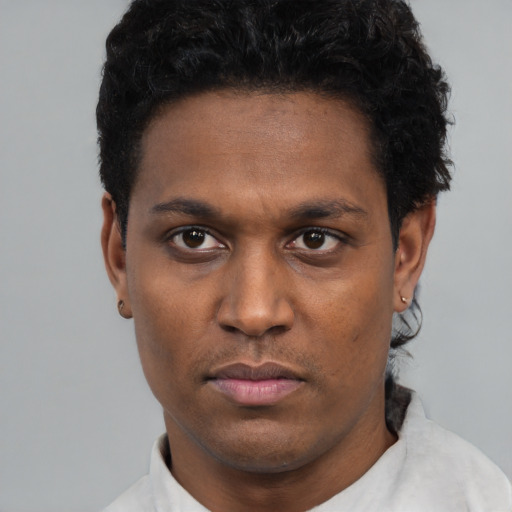 Neutral black young-adult male with short  black hair and brown eyes
