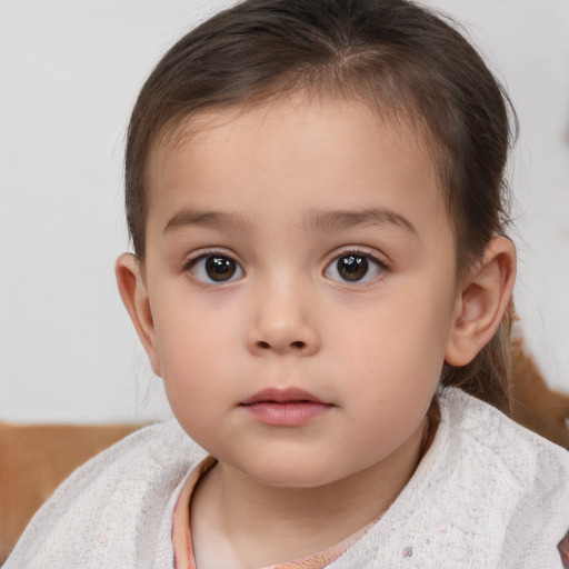 Neutral white child female with short  brown hair and brown eyes