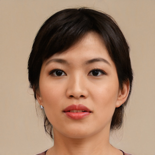 Neutral asian young-adult female with medium  black hair and brown eyes