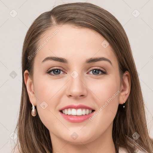 Joyful white young-adult female with long  brown hair and grey eyes