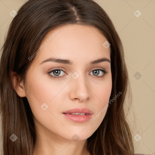 Neutral white young-adult female with long  brown hair and brown eyes