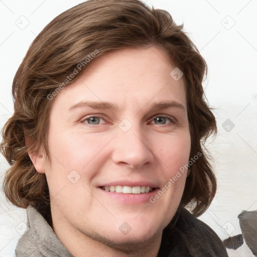 Joyful white young-adult female with medium  brown hair and blue eyes