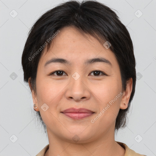 Joyful asian young-adult female with medium  brown hair and brown eyes