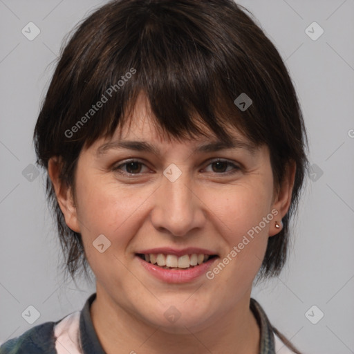 Joyful white adult female with medium  brown hair and brown eyes