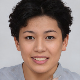 Joyful asian young-adult female with short  brown hair and brown eyes