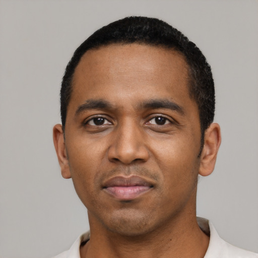 Neutral black young-adult male with short  black hair and brown eyes