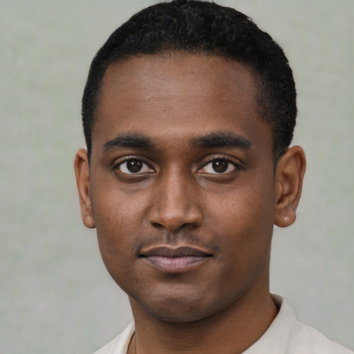 Neutral black young-adult male with short  black hair and brown eyes